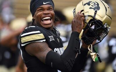 Travis Hunter firma por 46 millones de dólares, récord para un novato