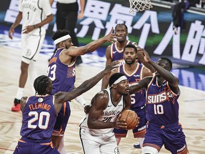 Suns se llevan el partido en la prórroga ante los Nets en China