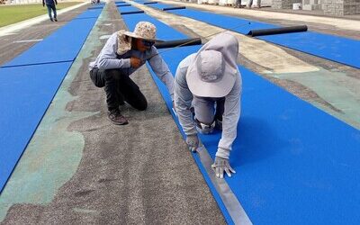 Comienzan a instalar pista del Estadio Olímpico Félix Sánchez